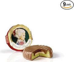 "Reber Constanze Mozart" pasta, Alpių pieno šokoladas, medaus kremo triufelis, riešutas, pistacijų marcipanas, 9 vnt.