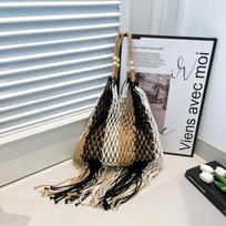 Lazy woven tassel portable shoulder hollow bag beach vacation niche leisure tote bag tide juoda