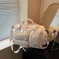 Large capacity luggage bag versatile short trip bag women's new wet and dry separation shoulder messenger bag beveik baltos spalvos