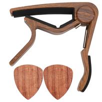 Akustinės gitaros kapodasteris, masyvi mediena, silikagelio spaustukas, ergonomika, su 2 plektrais bosinei gitarai, ukulelei, smuikui