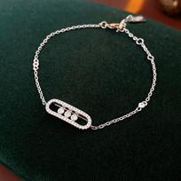 Cirkonio tuščiaviduris ir slankiojantis elipsės formos vėrinys - prabangus, minimalistinio stiliaus, išskirtinis apyrankė, aukštos kokybės, madingas. Hand bracelet - Silver