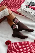 Kojinės kalėdinės su meškučiu Santa kepurėje – jaukumui ir šventinei nuotaikai.