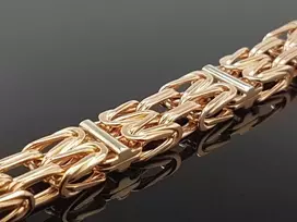 Auksinė apyrankė pitono rašto
