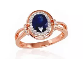 Auksinis žiedas su brangakmeniais. Metalas: Raudonas/Baltas Auksas. Praba: 585°. Akmuo: Briliantai , Safyras - 17 - 3.99 g. - Briliantai (0,177Ct), Safyras (1,428Ct)