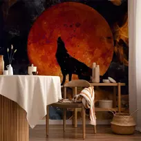 Artgeist Fototapetas - Wild nature - wolf on a background of a red moon in flames of fire