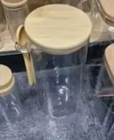 Stiklinis indas su mediniu dangteliu ir šaukšteliu