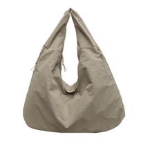 Slack fashion casual canvas tote bag women's new versatile large capacity armpit bag commuter shoulder bag chaki