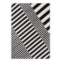 Rankų darbo juodos ir baltos spalvos iš vilnos kilimas 120x180 cm Stryve Flux – Elle Decoration