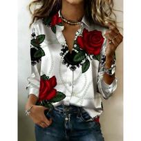The lady is wearing an elegant long-sleeved white shirt with floral design, which is very suitable for romantic outings and formal dinners. S