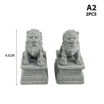 2 vnt. mini akmeninio liūto dekoro kiniško stiliaus liūto statula, darbalaukio fengšui puošmena 3*2.2*4.5cm
