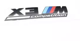 BMW X3 M F97 Konkurencija Galinė bagažinės emblema su užrašu 51148077609 Originali