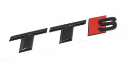 VAG "Audi TTS" užrašas Juodos spalvos emblema Logotipas Galinės durelės 8S0071804 Originali
