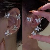 Women's butterfly earring set, including ear cuffs, earring backs, and climbing wrap-around earrings.