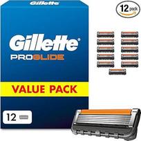 "Gillette Proglide" skustuvo peiliukai vyrams, 12 originalių atsarginių peiliukų - 2 tepimo juostelės prieš ir po peiliukų ir "Everglide" tepimo juostelės, užtikrinančios neįtikėtiną kruopštumą ir komfortą