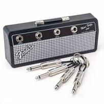 Sieninis raktų laikiklis su gitaros kištukais