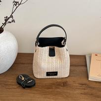 New summer seaside vacation feng shui bucket straw woven bag fresh splicing contrasting color simple woven women's bag juoda