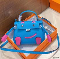 Aukščiausios kokybės viršutinio sluoksnio karvės odos millennial lėlės šypsenos veido rankinė mini rankinė nauja moteriška rankinė per petį crossbody rankinė 16*6*14cm