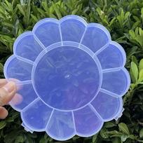 Plastikinė gėlių formos papuošalų dėžutė