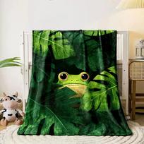 A green frog peeks through lush, textured tropical leaves. for all seasons blanket lunch break throw gift 80cm x 120cm