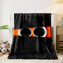 Large eyes with a sad expression peek through black horizontal slits. for all seasons blanket lunch break throw gift 80cm x 120cm