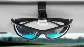 Universalus Kruger&Matz akinių laikiklis automobilio saulės skydeliui