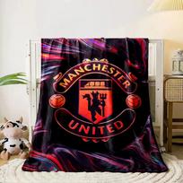The pattern features a Manchester United logo with swirling vibrant colors. for all seasons blanket lunch break throw gift 80cm x 120cm