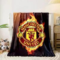 A flaming Manchester United logo with a dark background. for all seasons blanket lunch break throw gift 80cm x 120cm