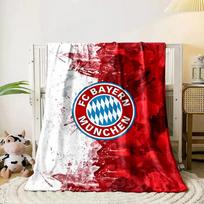 Tekstūruotas raudonas ir baltas fonas su centre esančiu FC Bayern München logotipu. visų sezonų antklodė pietų pertraukos pledas dovana 80cm x 120cm