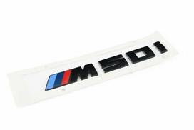BMW X6 G06 galinė bagažinės emblema "M50i" juoda 51142472842 originali