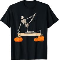 Skeleton Doing Reformer Pilates Machine Pumpkin Halloween T-Shirt S įvairiaspalvis