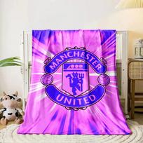 A purple Manchester United logo with a radiant pink and purple background. for all seasons blanket lunch break throw gift 80cm x 120cm