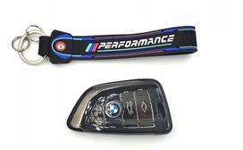 Riboto leidimo BMW M-PERFORMANCE raktų dangtelis ir tamsoje šviečiantis raktų žiedas