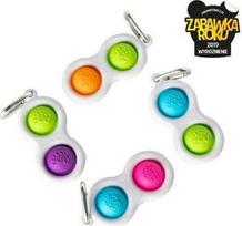 Fat Brain Toys Sensorinis žaislas - raktų pakabukas „Simpl Dimpl“ (įvairių spalvų)