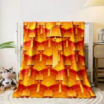 Golden bells with tags over a warm orange and yellow arched pattern. for all seasons blanket lunch break throw gift 80cm x 120cm