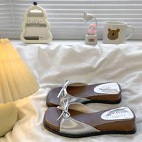 French temperament versatile bow one-word drag 2025 summer new with skirt fashionable height increase thick bottom cool slippers 35 sidabras