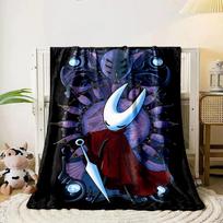 A central figure with horns, red cloak, surrounded by threads and needles. for all seasons blanket lunch break throw gift 80cm x 120cm