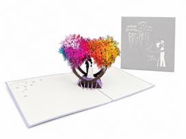 Išsiskleidžiantis 3D Pop-Up atvirukas vestuvėms - jaunieji po spalvota medžių arka, 15x15cm dydžio