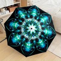 Folding Umbrella The umbrella features a symmetrical mandala pattern with vibrant blue and green starburst designs. Fits Trave