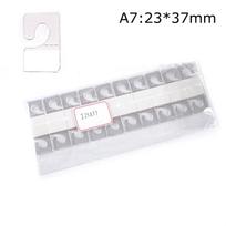 100pcs PVC Slot Hole Hooks Adhesive Hang Tags Merchandise Box Bag Hook Display Plastic Clear Hangers Packaging Accs