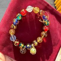 Duobao Gold Foil Glass Beaded Bracelet: Majestic Lion & Sutra Design with Blue, Yellow Accents brown