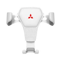 1Pcs Gravity Auto Phone Holder Car Air Vent Clip Mount Mobile Emblem For Mitsubishi Lancer ASX Mirage Pajero Xpander Attrage balta