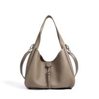 Mother and child bucket bag, commuter versatile messenger bag, female original new high-end light luxury leather shoulder bag base length 30cm, width 12cm, height 26cm