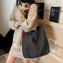 French lazy denim cloth bag for women 2026 new large capacity striped handbag super popular niche single shoulder bag