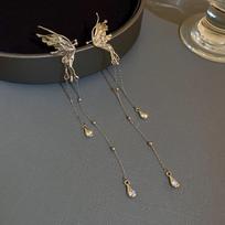 Super Fairy Bow Tassel Ear Clip for Women - No Piercing Cuff Earring with High-End Style and Unique Charm.