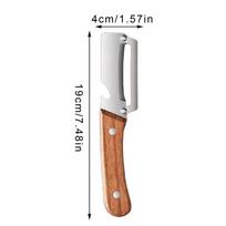 Stainless steel peeler with wooden handle for peeling and slicing fruits and vegetables Durable and smooth operation