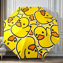 Folding Umbrella The umbrella features a repeated pattern of bright yellow cartoon ducks with orange beaks and black outline d