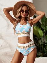 Moteriškas didelis perskeltas maudymosi kostiumėlis – europietiško ir amerikietiško stiliaus, margintas bikinis su užtrauktuku. S
