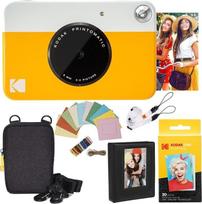 "Kodak Printomatic" momentinio fotoaparato (geltonos spalvos) "Deluxe" paketas + "Zink" popierius (20 lapų) + "Deluxe" dėklas + nuotraukų albumas + pakabinami rėmeliai + patogus kaklo dirželis