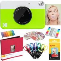 "Kodak Printomatic" momentinis fotoaparatas (žalias) + "Zink" popierius (20 lapų) + 8x8 medžiaginis albumas + 12 žymeklių su dvigubu antgaliu + 100 sienų lipdukų + 6 dekoratyvinės žirklės + "Washi" juosta