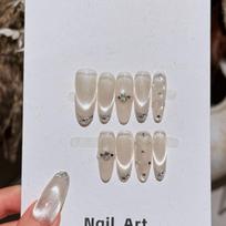 10Pcs Handmade Nude White Cat Eye Fake Nails with Silver Glitter French Tips & Rhinestone Accents XS